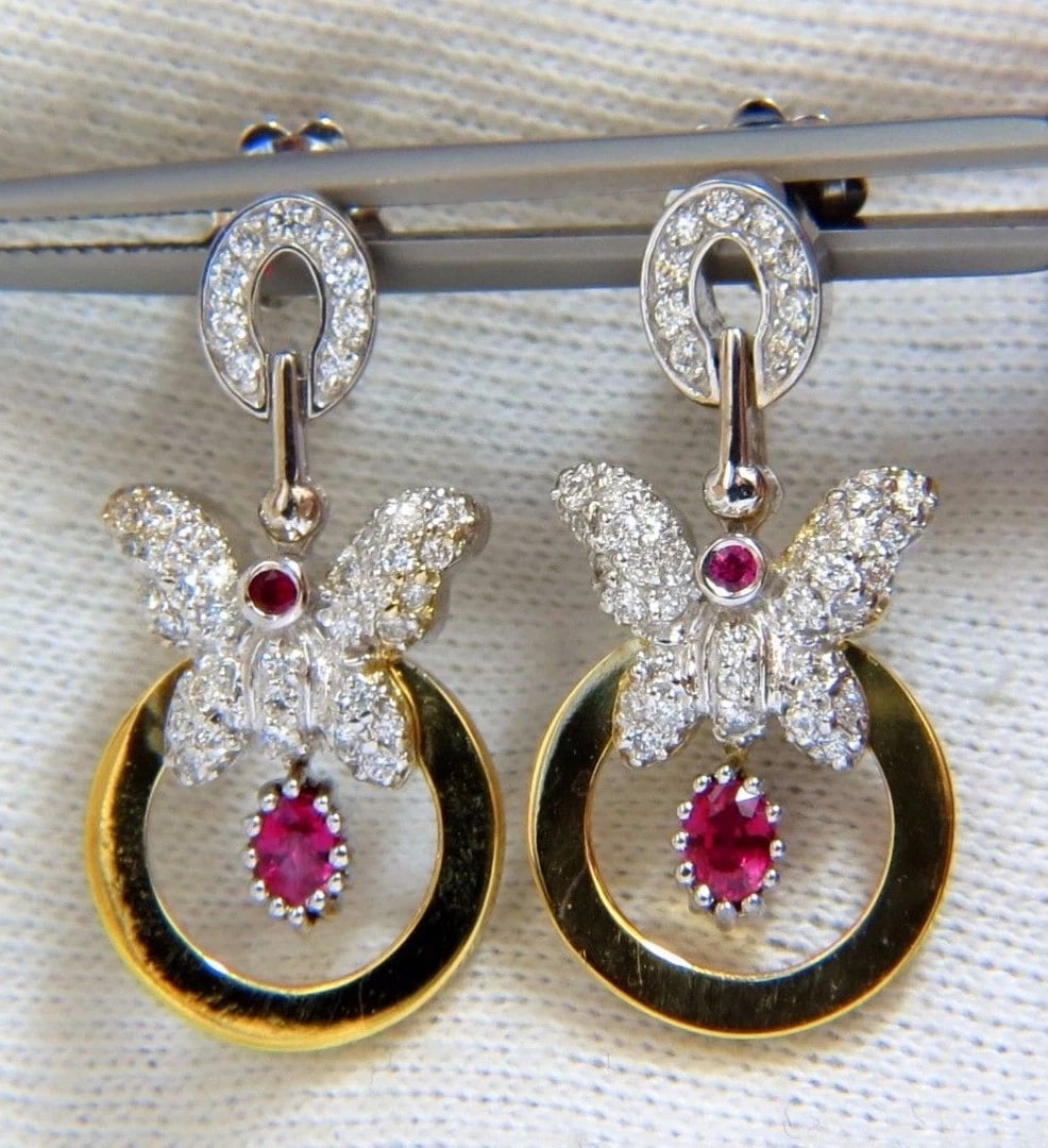 1.70CT NATURAL OVAL BRIGHT RED RUBY DIAMOND DANGLE BUTTERFLY EARRINGS 14KT: Title: 1.70CT NATURAL OVAL BRIGHT RED RUBY DIAMOND DANGLE BUTTERFLY EARRINGS 14KT Description: .50ct. Natural Rubies & 1.30ct. diamonds dangle butterfly earrings. Rubies: oval cut, transparent & clean