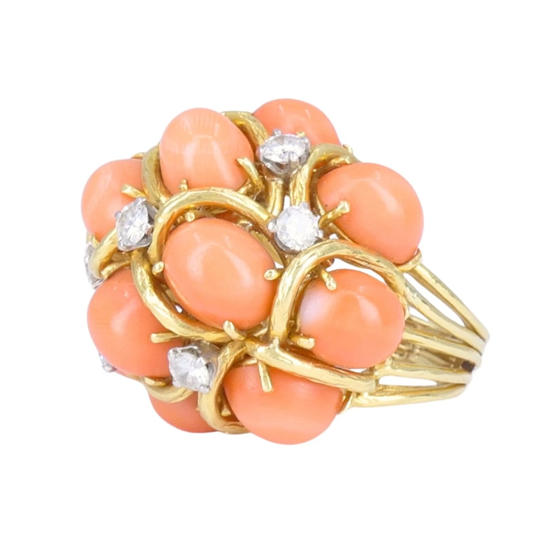 David Webb 18k Gold Coral Diamond Cocktail: KL TITO David Webb 18k yellow gold coral and diamond cocktail ring, circa 1960s to 1970s, designed with a dimensional cluster of oval coral cabochons accented by diamonds set in white gold. The ring f