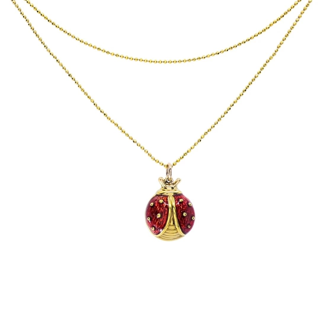 18k Gold Enamel Ladybug Pendant 14k Gold Chain Necklace: ES JNOO Product details: MATERIALS: 14k & 18k Gold, Enamel WEIGHT: 6.5 Grams MEASUREMENTS: Pendant - 5/8" Chain - 22" HALLMARKS: 14K, 18K ITEM DETAILS: 18k Gold Enamel Ladybug Pendant 14k Gold Chain