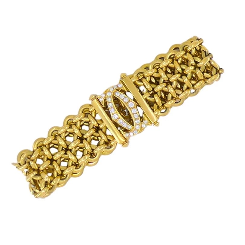 Cartier Penelope BRACELET Double C 18k Gold Diamond Link Bracelet Estate Jewelry: VK JNTOO CARTIER 18 karat Yellow Gold Diamond Penelope Double "C" Bracelet A vintage Cartier Double C Penelope 3-row bracelet made of 18k yellow gold and finished with brilliant diamonds set into the 