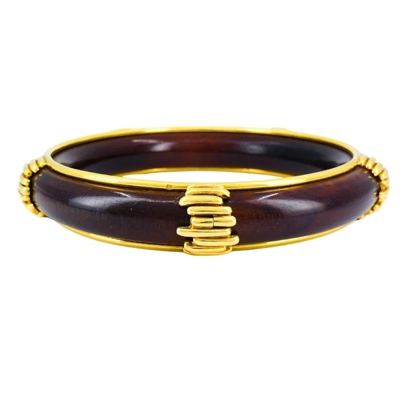 Vintage Van Cleef & Arpels 18k Gold Wood BANGLE BRACELET Estate Jewelry: VK JITOO VAN CLEEF & ARPELS 18 karat Yellow Gold Wood Bangle Bracelet This vintage Van Cleef & Arpels bangle bracelet pairs rich natural wood with 18k yellow gold for a distinctive and refined look. T