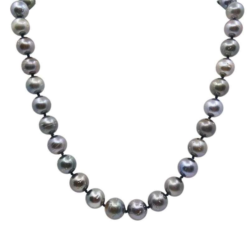 Tahitian Pearl Necklace 14k Gold Clasp: ES IOOO Product details: MATERIALS: 14k Gold GEMSTONE: Pearl WEIGHT: 75.8 Grams MEASUREMENTS: 17" Beads Diameter - 3/8" - 7/16 HALLMARKS: 585 ITEM DETAILS: Tahitian Pearl Necklace 14k Gold Clasp
