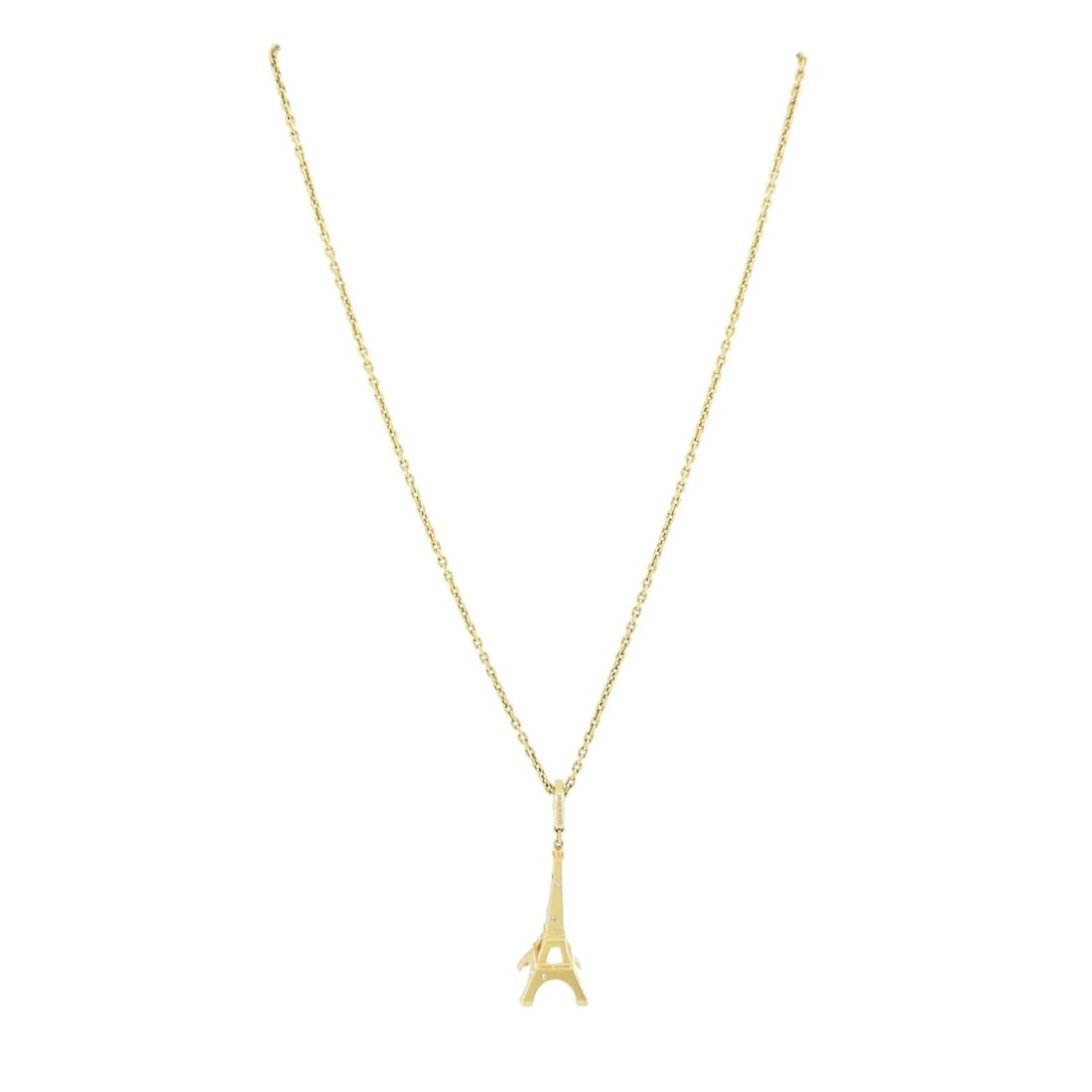 Louis Vuitton 18k Gold Diamond Eiffel Tower French Pendant Necklace: KL ITOO A collectible Louis Vuitton Eiffel Tower pendant necklace, beautifully crafted in 18K yellow gold and accented with brilliant-cut diamonds. This sculptural design pays homage to the