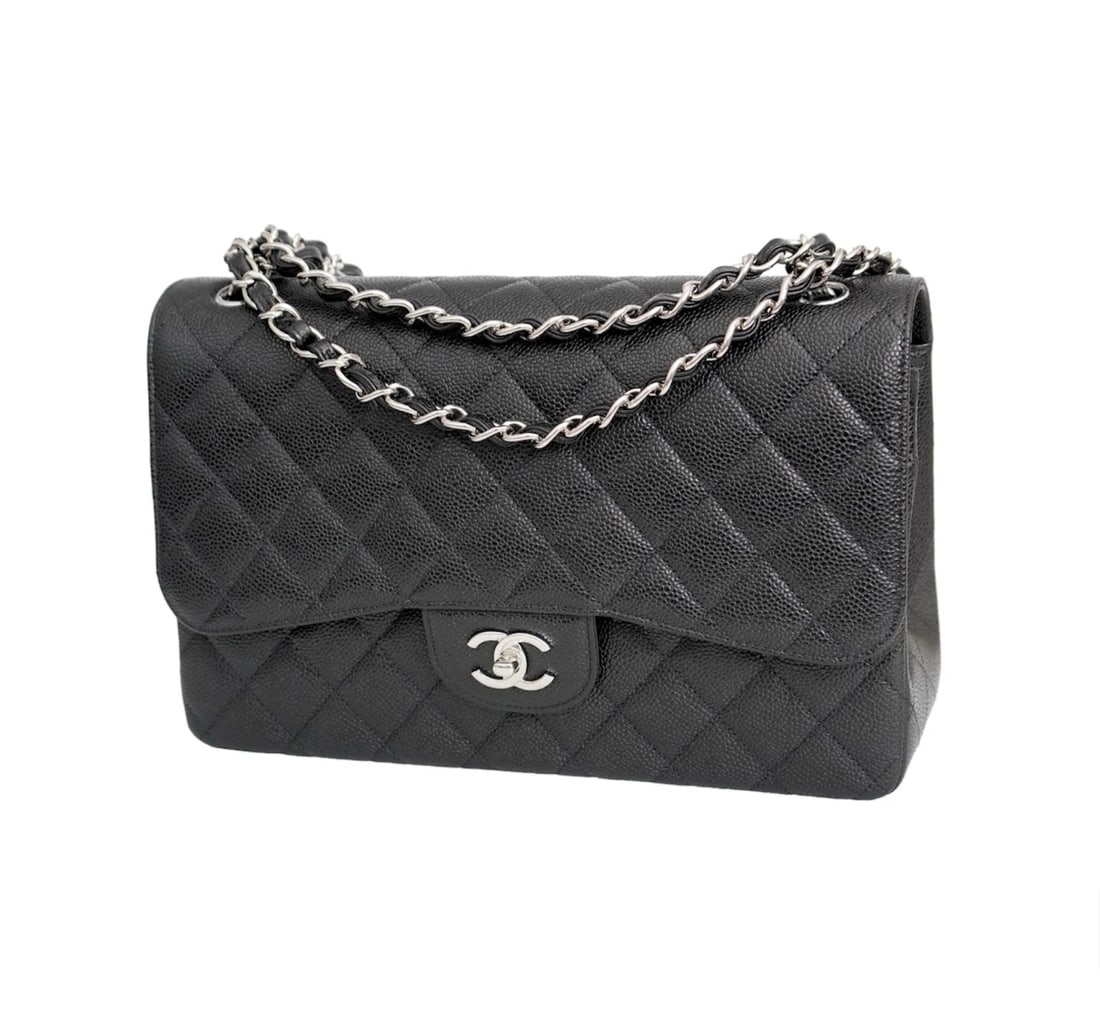 Chanel Jumbo Caviar Leather Black Classic Flap Bag: KL JONOA Chanel Jumbo Caviar Leather Black Classic Flap Bag. Silver Hardware - Perfect condition - New with box Depth: 3.25 Length: 12” Height: 8” Handle Drop: 13.5” Reserve: $10,800