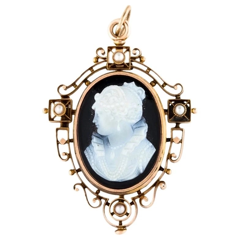 Antique 12k Gold Agate Cameo Pendant Brooch Seed Pearls: ES JGTO Product details: DESIGNER: Unknown MATERIALS: 12k Gold WEIGHT: 17.4 Grams MEASUREMENTS: 1 1/2" x 2" ITEM DETAILS: Antique 12k Gold Agate Cameo Pendant Brooch Seed Pearls This exquisite