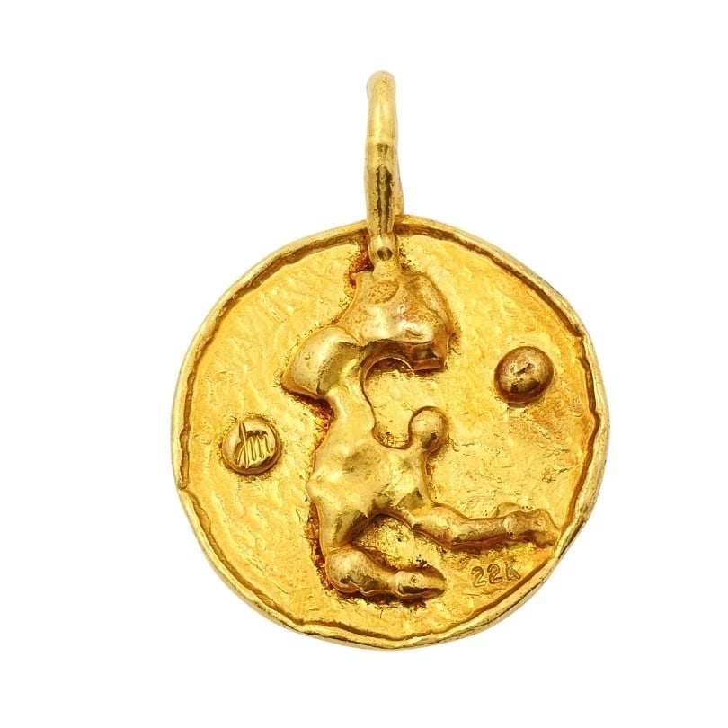 Jean Mahie 22k Gold Sculptural Abstract Pendant: ES URTO Product details: DESIGNER: Jean Mahie CIRCA: 1980’s MATERIALS: 22k Yellow Gold WEIGHT: 13.9 Grams MEASUREMENTS: Diameter - 1 1/8" HALLMARKS: Maker’s Mark, 22K ITEM DETAILS: Jean