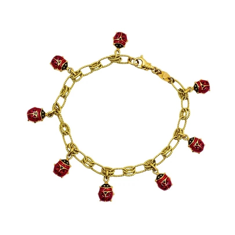 18k Gold Chain 14k Gold Enamel Ladybug Charms Bracelet: ES UOOO Product details: MATERIALS: Charms - 14k Gold, Chain - 18k Gold, Enamel WEIGHT: 11.8 Grams MEASUREMENTS: Length - 7", Charm - 1/4" x 5/16" HALLMARKS: 14K, Italy, 750, Italy ITEM DETAILS: 18k G