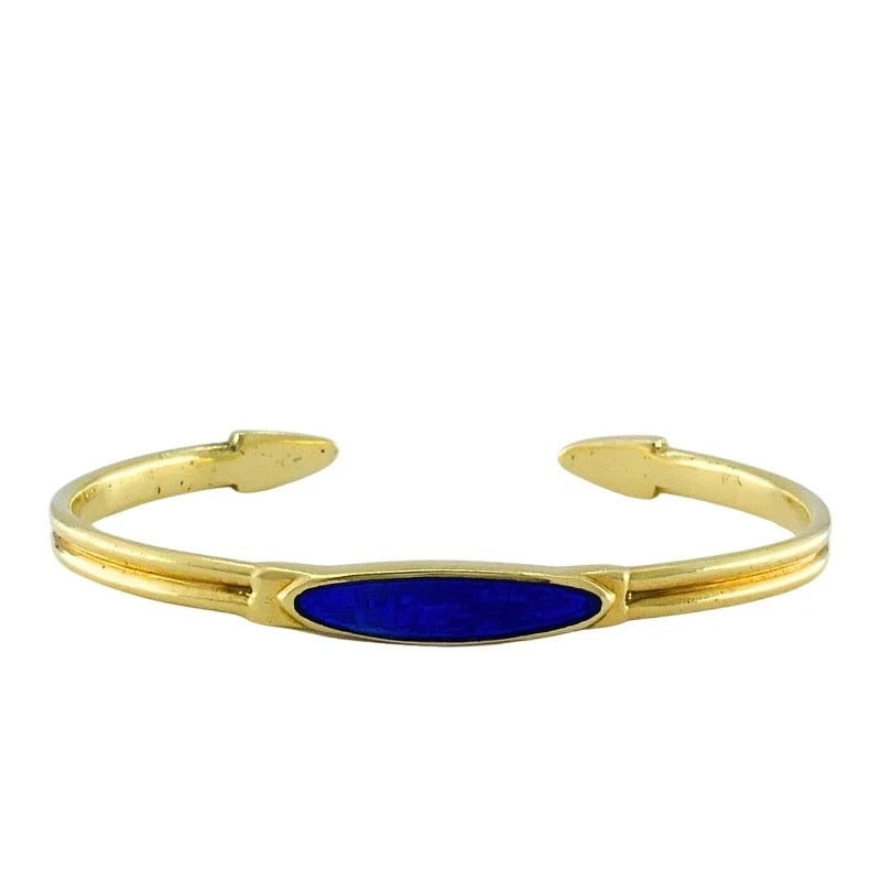 Vintage 18k Gold Blue Enamel Bangle Bracelet: ES JJOO Product details: MATERIALS: 18k Yellow Gold WEIGHT: 18.9 Grams MEASUREMENTS: 5 1/2" inner circumference x 1/8" HALLMARKS: 18K ITEM DETAILS: Vintage 18k Gold Blue Enamel Bangle Bracelet A