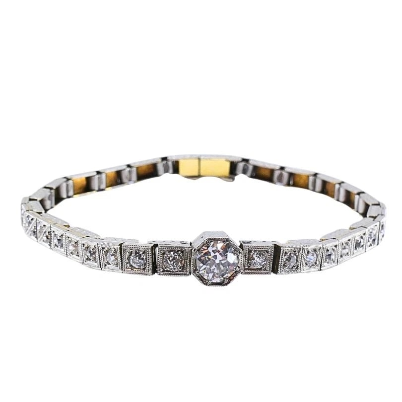 Vintage 14k White Gold Diamond Bracelet Estate Jewelry: ES UEOO Product details: MATERIALS: 14k Gold GEMSTONE: Diamond WEIGHT: 15.6 Grams MEASUREMENTS: 1/8” x 7" HALLMARKS: 14K ITEM DETAILS: Vintage 14k White Gold Diamond Bracelet Estate Jewelry A