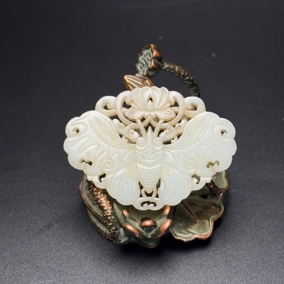 Old Hetian Jade Pendant - Butterfly: Title: Old Hetian Jade Dragon Pendant Date/Period: After2032 Origin: Chinese Dimension: 59x80x25(mm) 2.32x3.15x0.98(inches) Weight 0.35 lbs/157g Materials: Hetian Jade Reserve: $220.00 Shipping: Domes