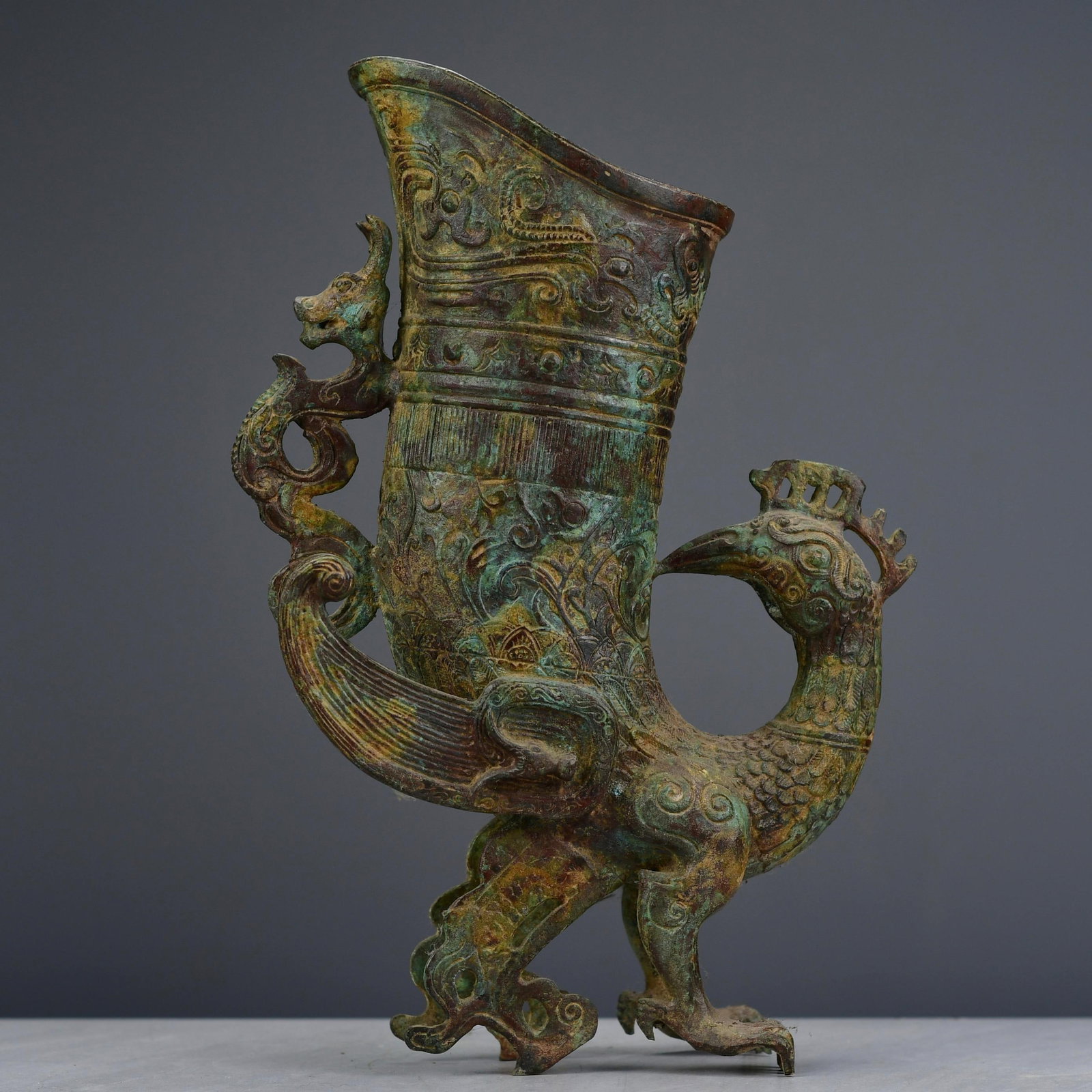 Old Bronze Phoenix Cup Statue: Title: Old Hetian Jade Dragon Pendant Date/Period: After2048 Origin: Chinese Dimension: 59x80x25(mm) 2.32x3.15x0.98(inches) Weight 0.35 lbs/157g Materials: Hetian Jade Reserve: $538.00 Shipping: Domes