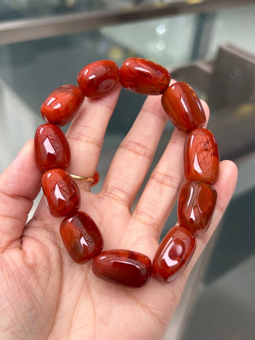 Chinese Natural Nanhong Agate Original Stone Bracelet: Title: Old Hetian Jade Dragon Pendant Date/Period: After2055 Origin: Chinese Dimension: 59x80x25(mm) 2.32x3.15x0.98(inches) Weight 0.35 lbs/157g Materials: Hetian Jade Reserve: $399.00 Shipping: Domes