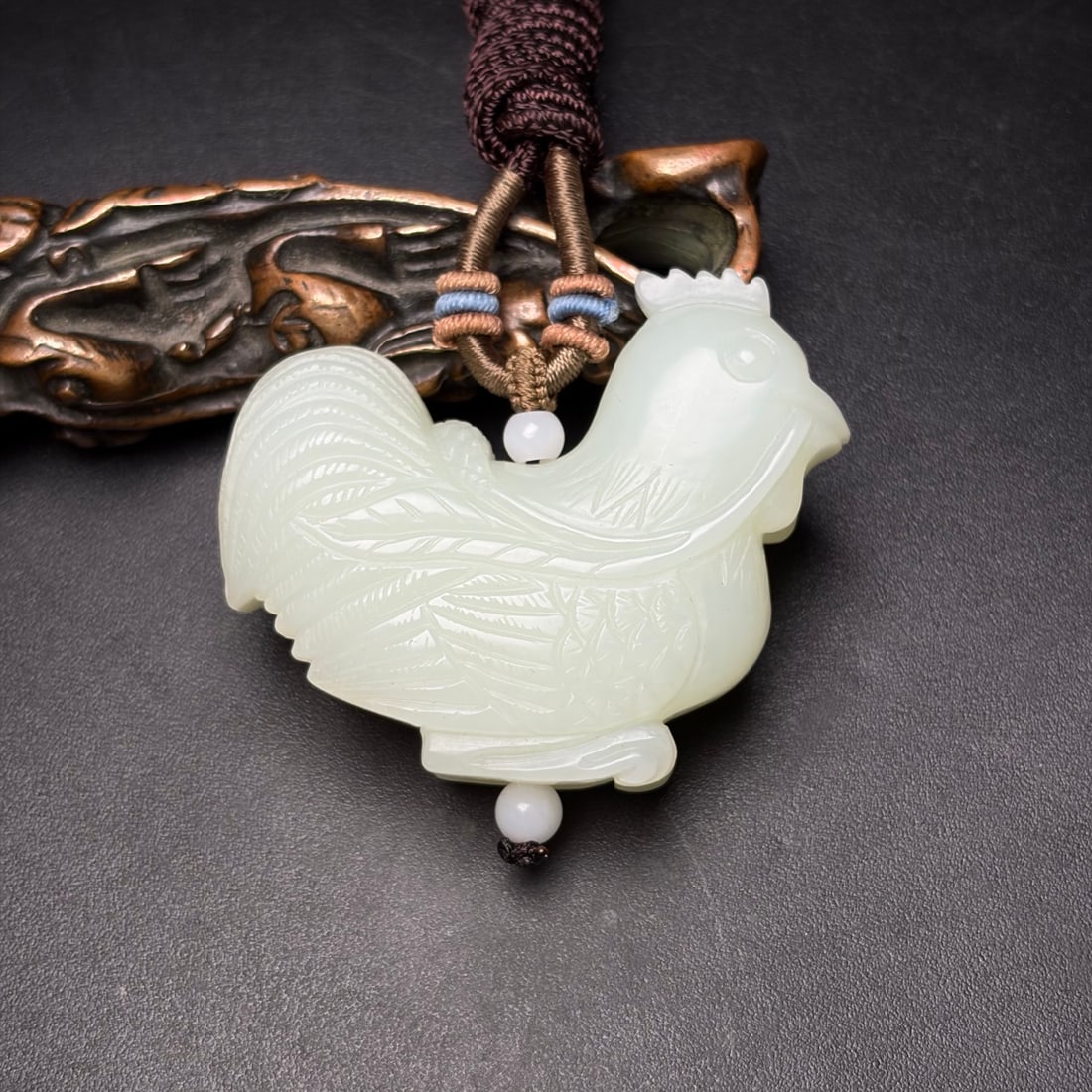 Natural White Hetian Jade Pendant - Rooster: Title: Old Hetian Jade Dragon Pendant Date/Period: After2096 Origin: Chinese Dimension: 59x80x25(mm) 2.32x3.15x0.98(inches) Weight 0.35 lbs/157g Materials: Hetian Jade Reserve: $450.00 Shipping: