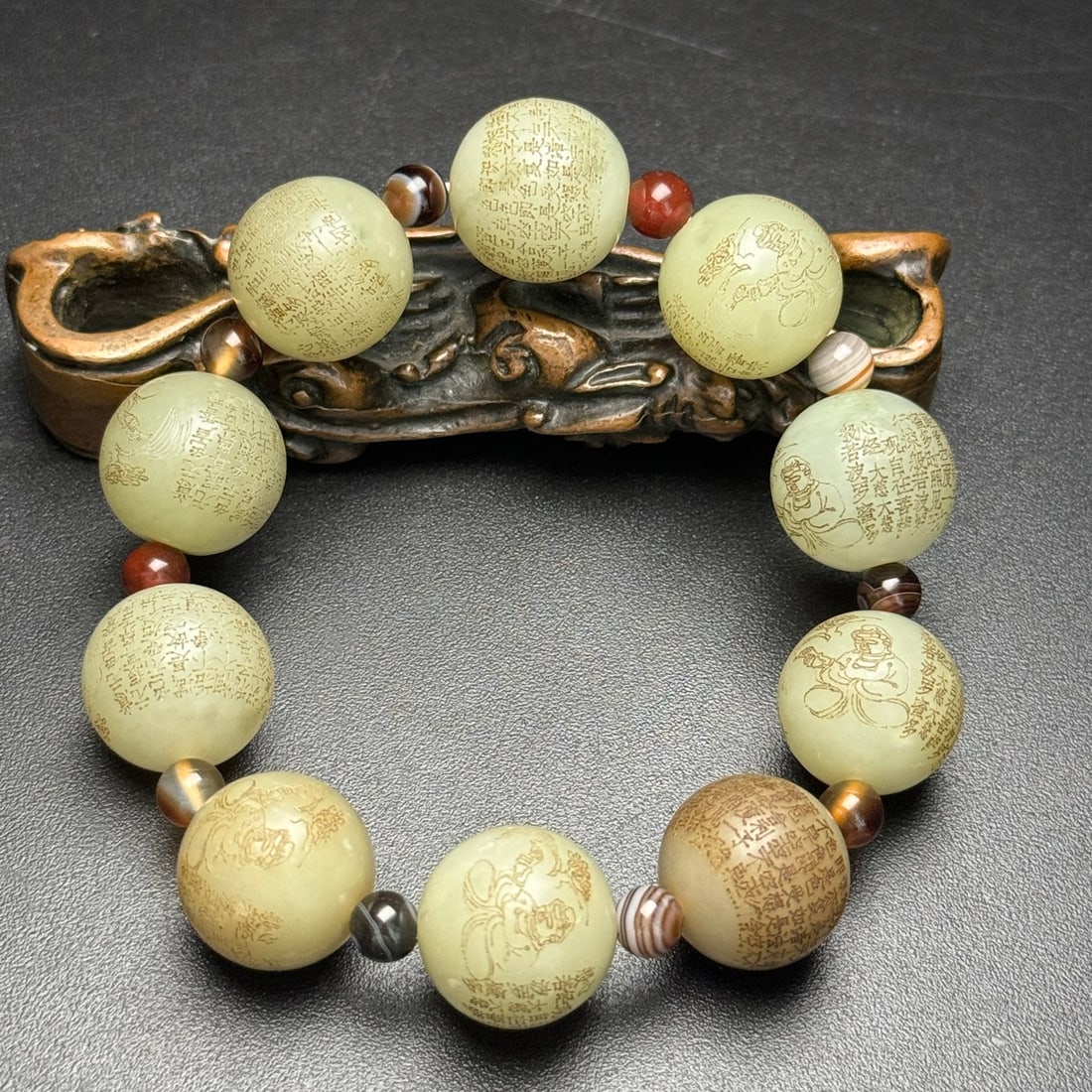 Old Hetian Jade Carved Kwan-yin & Heart Sutra Bracelet: Title: Old Hetian Jade Dragon Pendant Date/Period: After2100 Origin: Chinese Dimension: 59x80x25(mm) 2.32x3.15x0.98(inches) Weight 0.35 lbs/157g Materials: Hetian Jade Reserve: $150.00 Shipping: Domes