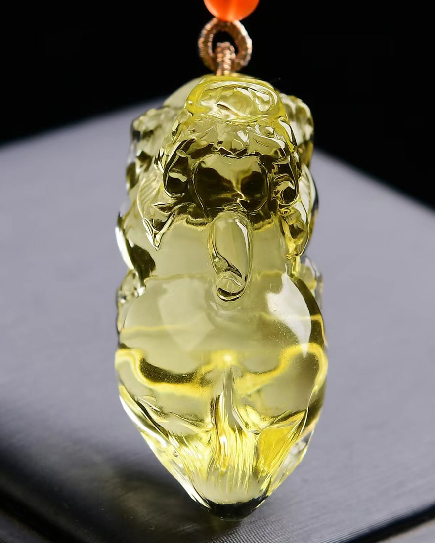 Yellow Crystal Carved Pixiu Pendant: Title: Old Hetian Jade Dragon Pendant Date/Period: After2134 Origin: Chinese Dimension: 59x80x25(mm) 2.32x3.15x0.98(inches) Weight 0.35 lbs/157g Materials: Hetian Jade Reserve: $220.00 Shipping: