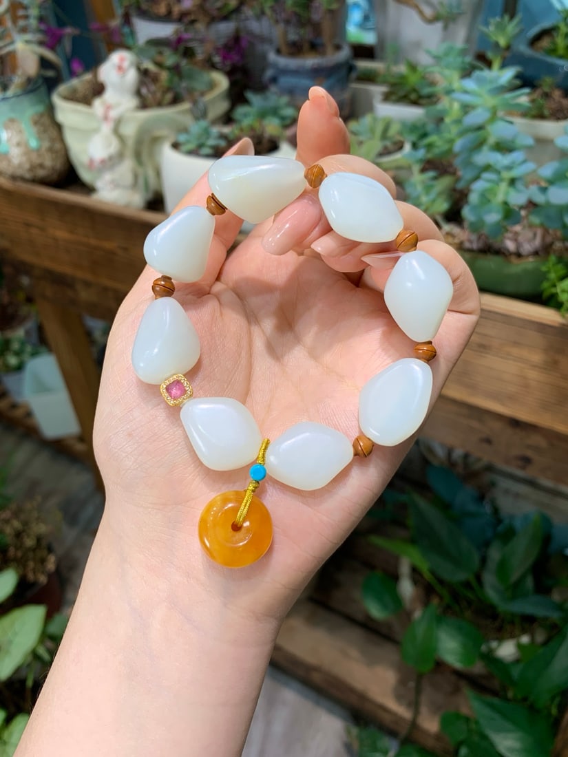 Hetian Jade Original Stone Bracelet: Title: Old Hetian Jade Dragon Pendant Date/Period: After2171 Origin: Chinese Dimension: 59x80x25(mm) 2.32x3.15x0.98(inches) Weight 0.35 lbs/157g Materials: Hetian Jade Reserve: $288.00 Shipping: