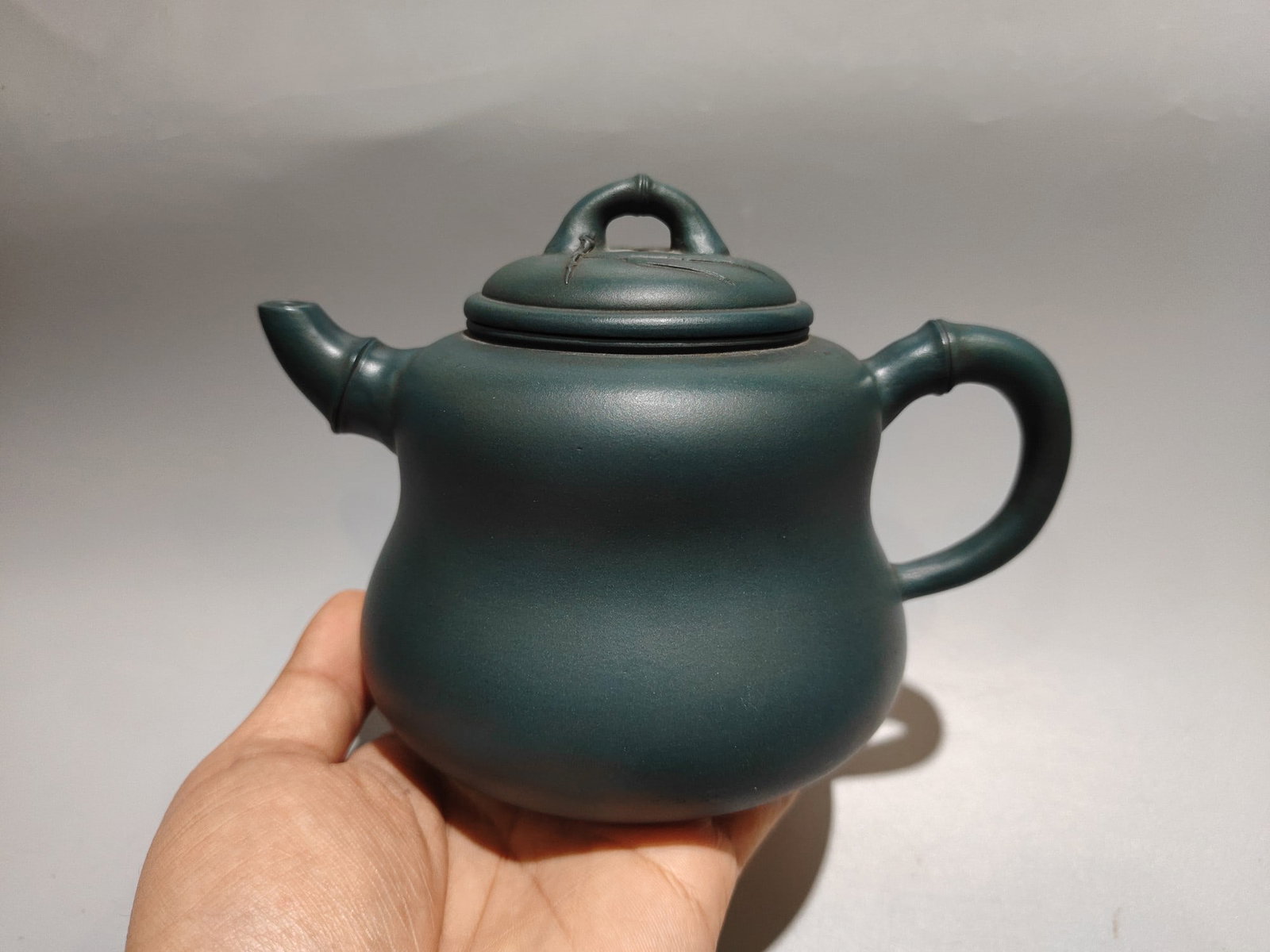 Blue Yixing Zisha Clay Teapot: Title: Old Hetian Jade Dragon Pendant Date/Period: After2192 Origin: Chinese Dimension: 59x80x25(mm) 2.32x3.15x0.98(inches) Weight 0.35 lbs/157g Materials: Hetian Jade Reserve: $259.00 Shipping: Domes