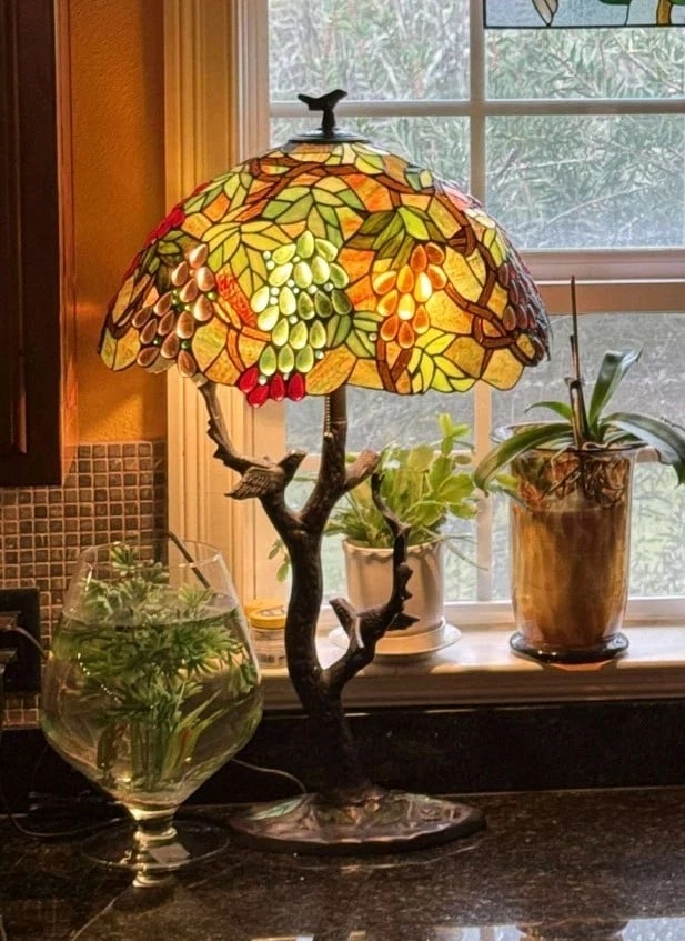 32.5" Stained Glass Grapes Table Lamp: 32.5" Tall x 20" wide oval shape shade Stunning new reproduction lamp with two birds sitting on a branch as a base. These captivating reproduction stained glass pieces are crafted using the exact tech