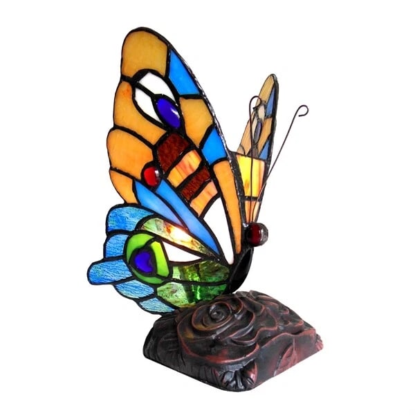 9.25" Blue Butterfly Stained Glass Accent light Lamp: Description 9.25" Tall x 8.75" Wide Great reproduction glass butterfly panel. This piece is hand made from individually cut pieces of glass. The technique used to make this are the same used by Louis 