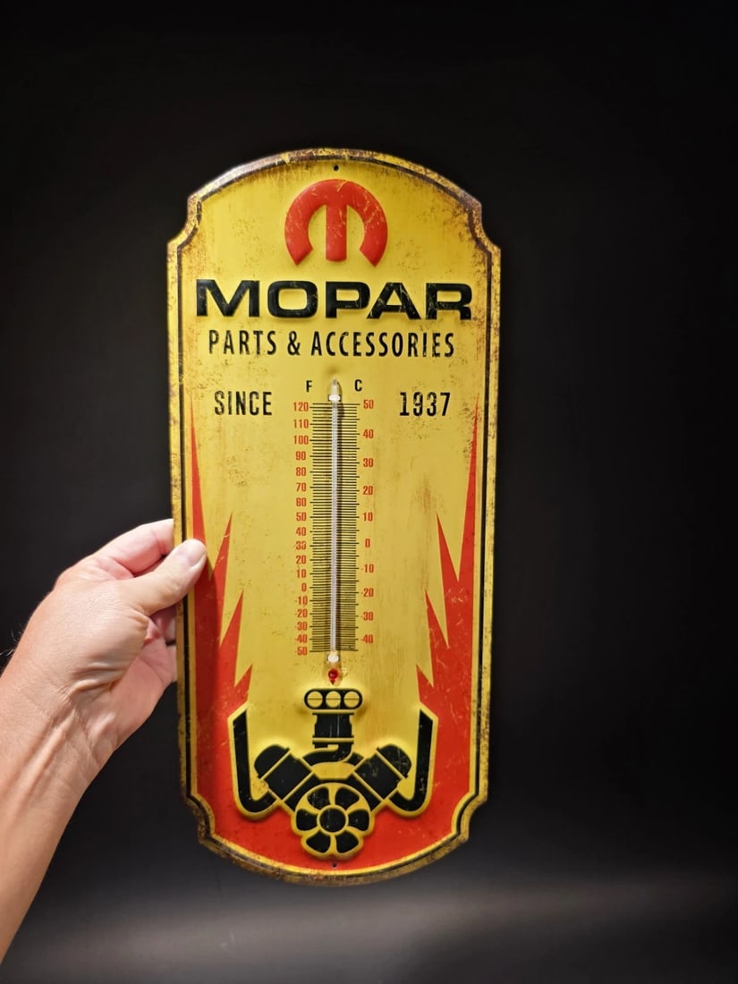 17.5 " Metal Vintage Style Mopar Thermometer Sign: 17.5 x 7.5 in This classic reproduction Mopar thermometer is a must-have for any garage or man cave. Crafted from durable 24 gauge steel and printed with UV-resistant inks, this thermometer is built