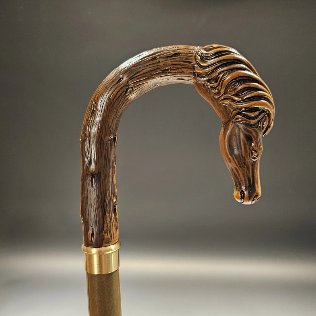 36" Horse Head Walking Stick Cane: 36" Long 3/4" shaft Introducing our beloved reproduction horse head walking cane, originating from Italy. Crafted from robust cellulose acetate, this handle sits atop a 3/4" beechwood shaft with a