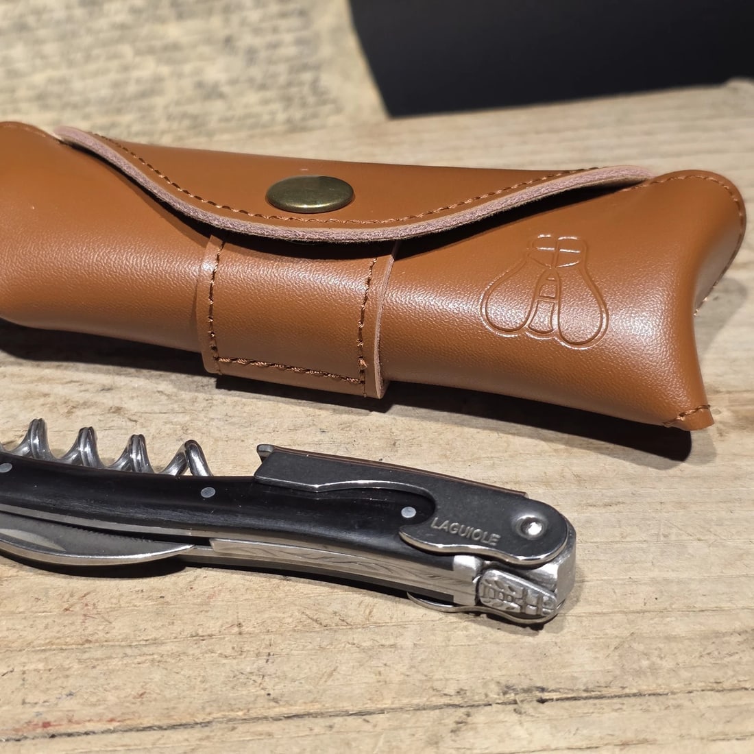 Laguiole Corkscrew with Black Horn Handles Leather Pouch: 4 1/2" long x 5/8" Wide Nice quality, brand new, never used heavy waiters style Laguiole corkscrew with bovine ox horn handles, stainless steel. The corkscrew features a ribbed worm for steady cork re