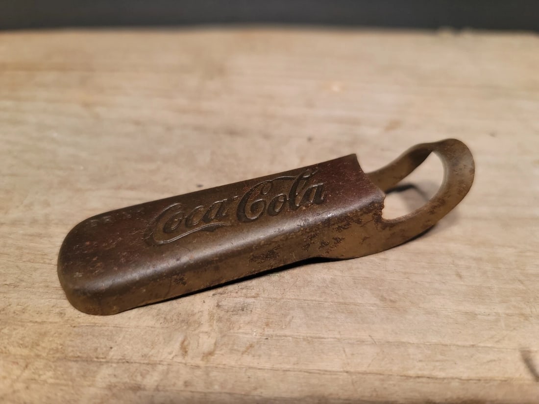 Metal Coca Cola Bottle Opener: 3 1/2" Long Nice reproduction coca cola bottle opener silver pewter color likely steel. Great for a key chain or as a collectible. Hard to tell its age! Reserve: $10.00 Shipping: Domestic: Flat-rate