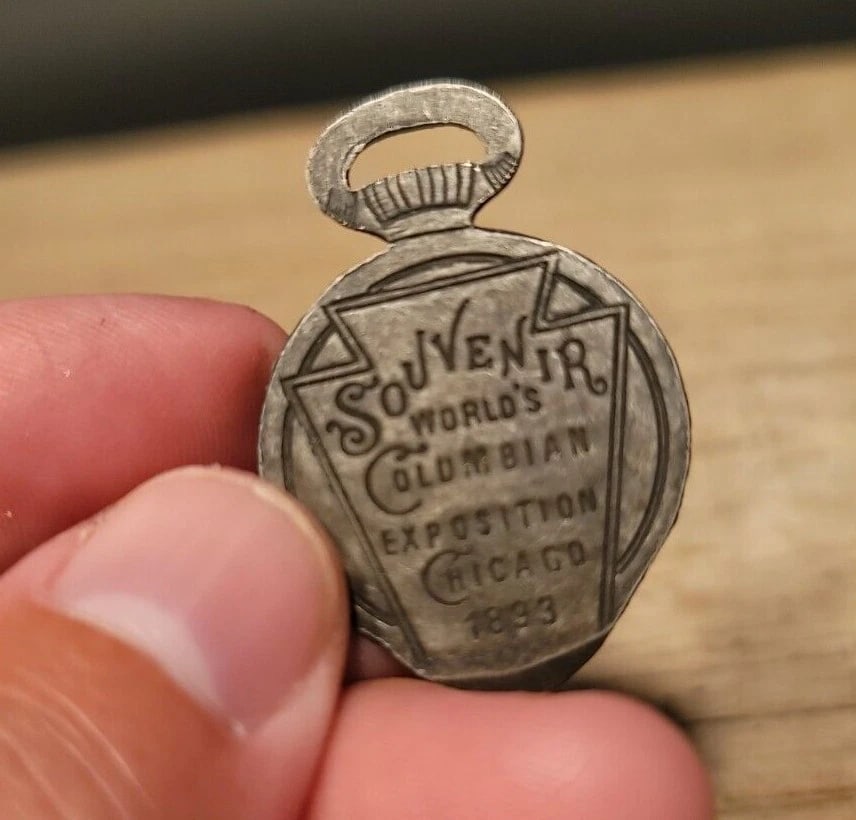 Pocket Watch Case Opener Souvenir: 1 1/2" Tall Nice souvenir watch case opener. Items like this were given as useful souvenirs back in the day. Hard to tell its age. Reserve: $10.00 Shipping: Domestic: Flat-rate of $5.00 to anywhere
