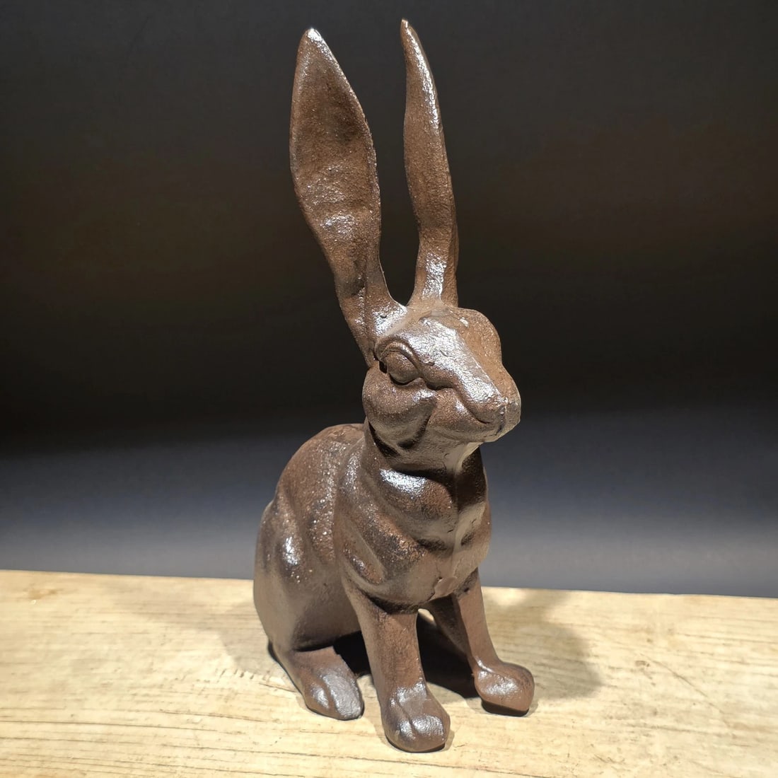 Cast Iron Rabbit Door Stop Hare Statue: Cast iron figurine depicting a jackrabbit or hare with exaggerated upright ears and alert expression. Rabbits and hares have long appeared in cast iron garden decor, folk art, and animal figurines, sy