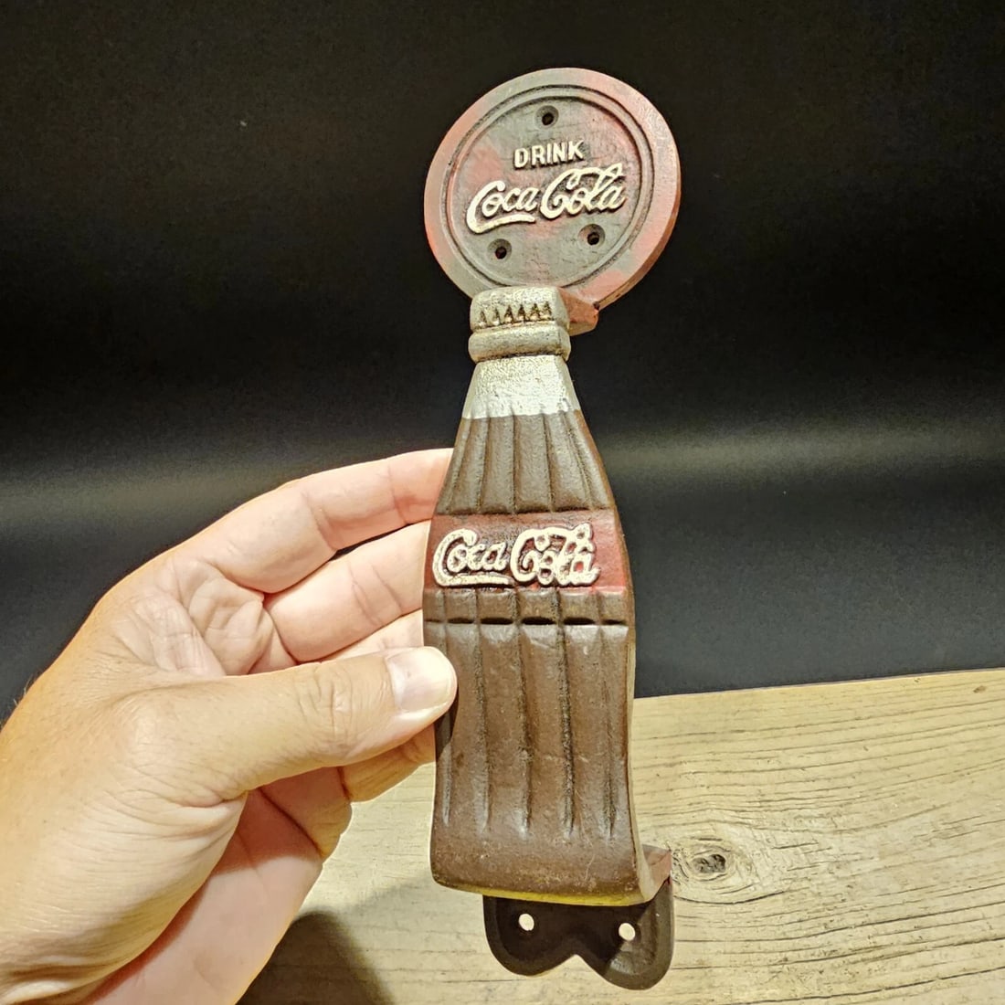 Antique Cast Iron Coca Cola Door Gate Handle: Description 10" Long 3" Wide Great reproduction handmade handle, all cast iron. Wonderful detail. Heavy cast iron with red, silver and brown painted raised details charming antique finish. Reserve: $2