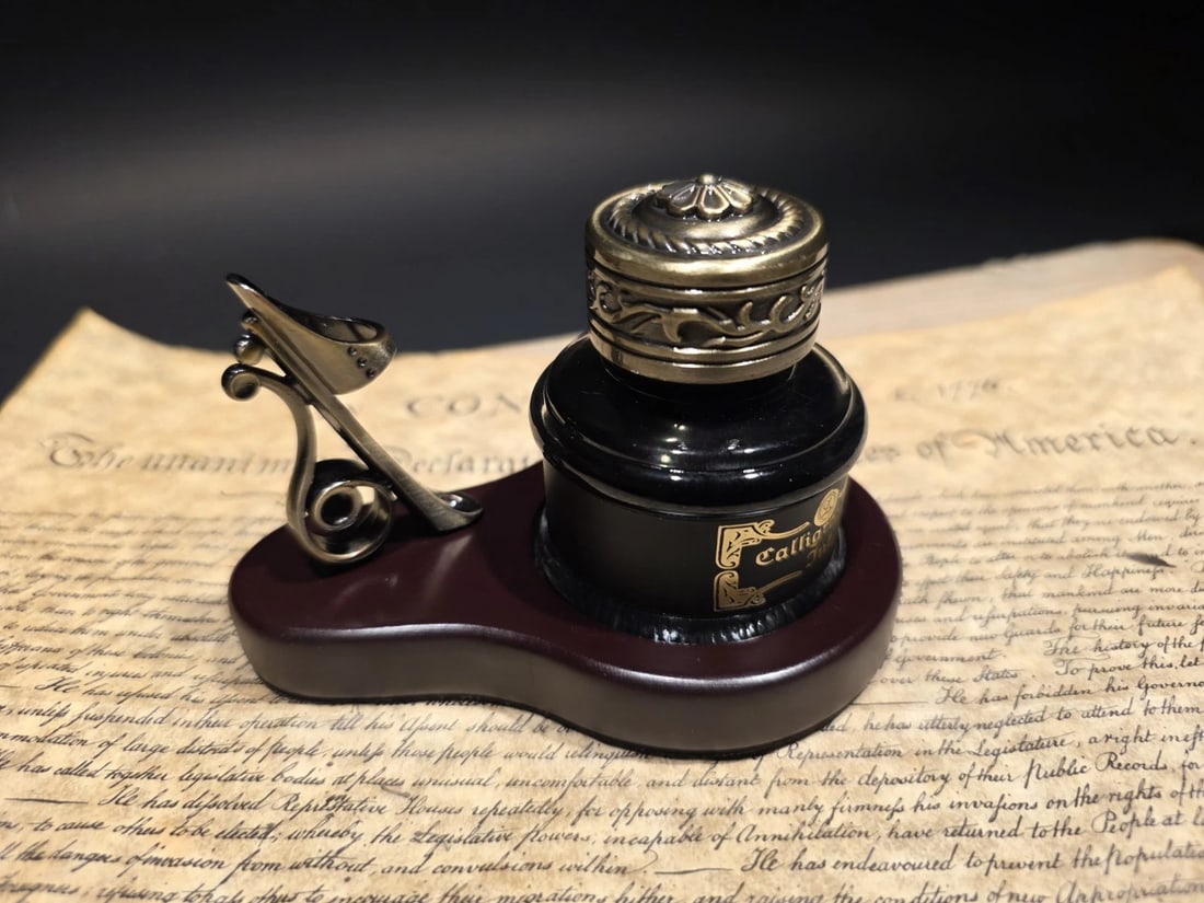 Inkwell Bottle With Metal Pen Holder Wood Base 1.5 Oz Black Ink: Glass Inkwell filled with Quality Black Writing Ink - water-based 40ml (1.53 ozs.) * 3/8" diameter opening to hold any pen of your choosing A classic desk set inspired by early writing tables,