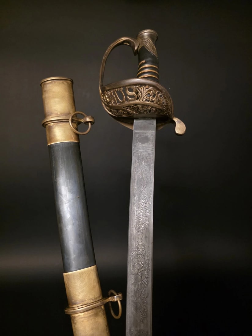 1850 Union Officer's Civil War Sword: 33" Blade 39" Long with handle...with scabbard 40 1/2" Antique-Style Union Officers Sword - Aged Brass & Leather Reproduction with Steel Scabbard This new reproduction faithfully captures the look