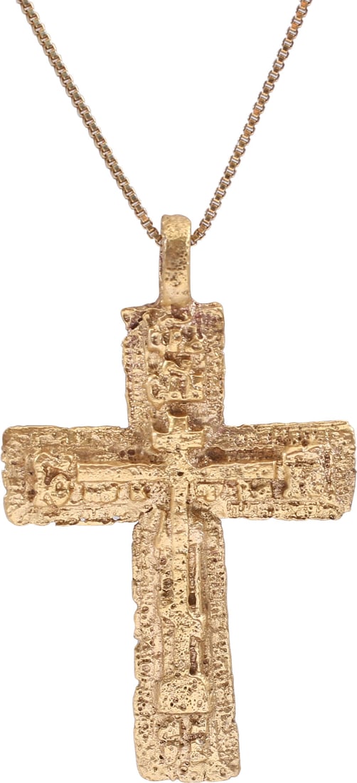 SUPERB EASTERN EUROPEAN CROSS, 17TH-18TH CENT: Ukrainian or Russian. Gilt bronze, just over 1 1/2" plus the loop in height. Modeled in good relief with raised vacant cross (no Corpus Christi) with charges above and cipher (?) panels at the cross b