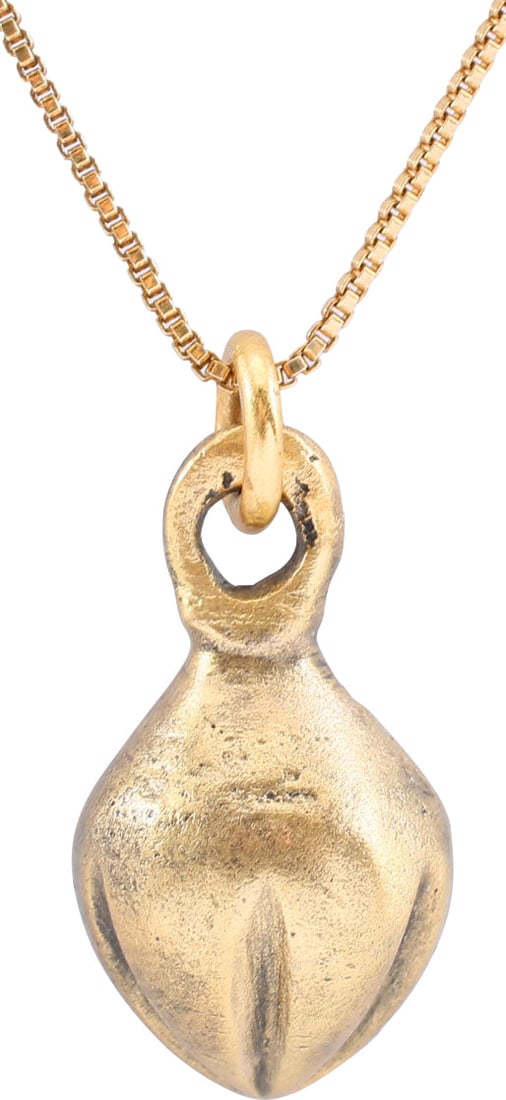 ANCIENT ROMAN SHELL PENDANT NECKLACE C.100-350 AD: Gilt bronze, about 5/8" in height plus the ring. Large domed form, fluted and the back recessed. A form about which there is some uncertainty. Romans were very dependent on the sea and used sea
