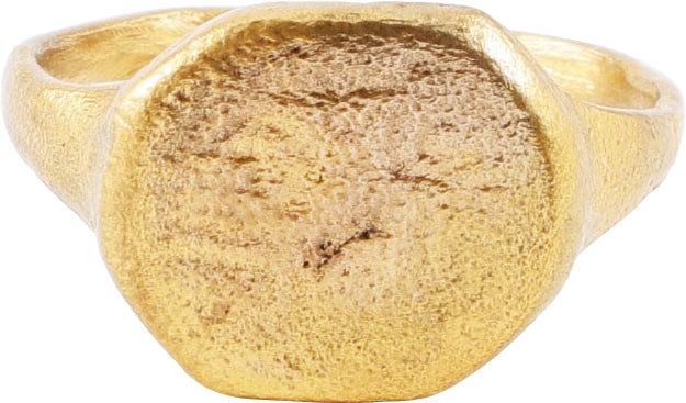CRUSADER'S RING, 13TH CENTURY, SIZE 10: Gilt bronze, slightly under size 10 with raised bezel incised with the classic representation of the Star of Bethlehem (much worn) in its later six point iteration which may also embrace the pagan, wh