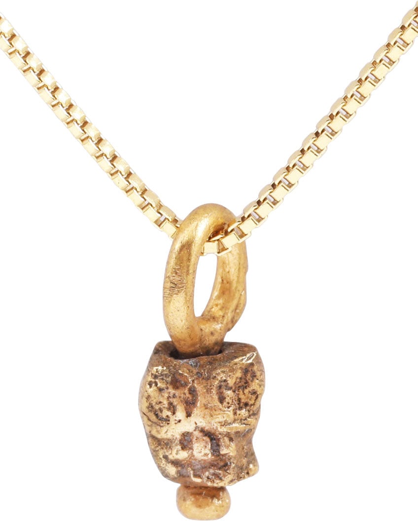 MEDIEVAL TIBETAN SKULL PRAYER BEAD: This small bronze bead, hand crafted about 1400-1550 was part of a Buddhist prayer ritual. It was strung along with others, each showing differences from hand work, to aid the devotee by focusing conc