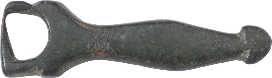 ROMAN LEGIONARY'S SWORD BELT TERMINAL, 2nd-3rd CENTURY AD: Bronze, tear-shaped with a stirrup form end. At the time, legionary's sword belts had split ends with two terminals. This example is 1 5/8" long and in condition as found. Certificate of