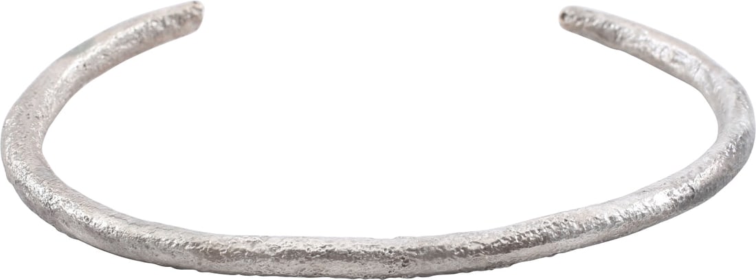 VIKING WARRIOR'S BRACELET OR ARMLET: Exceptionally heavy and somewhat crude suggesting provincial manufacture. 2.94" inside dimension and 3.28" outside. Suitable for wear on the wrist or forearm and possibly made for a Viking woman warri