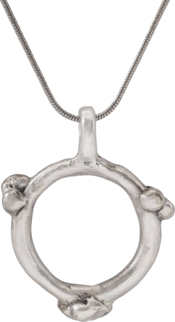 CELTIC PROSPERITY RING NECKLACE, C.300-100 BC: Before the Roman invasion of the British Isles, rings of bronze, silver, and gold were used as a means of exchange, particularly in Ireland. Most exchanges of goods and property were conducted by bart