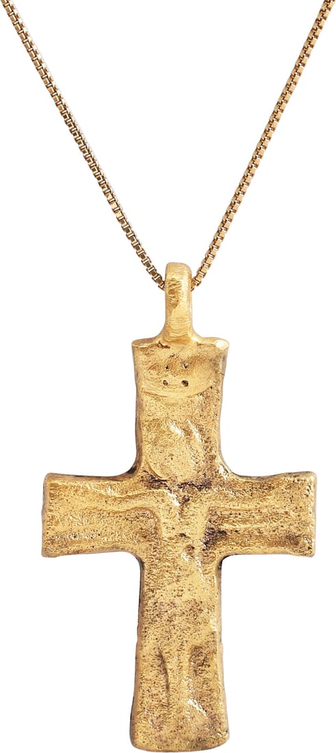 FINE MEDIEVAL PILGRIM'S OR CRUSADER'S CROSS, 8TH-11TH CENTURY AD: Gilt bronze, over 1 1/2" in height plus the suspension loop. The beam ends slightly flared and the cross beam centered. Corpus Christi with arms outstretched and hooded oval face in the Early Medieval