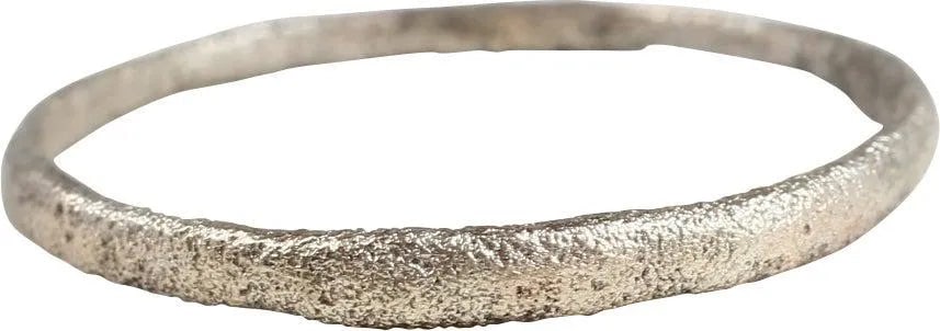 VIKING WEDDING RING C.850-1050 AD, SIZE 11 3/4: Silvered bronze, large size 11 3/4. Rounded section face. 1.9mm band width. Vikings exchanged rings on the pommel of the groom's sword. Surface textured from burial. Professionally refurbished with th