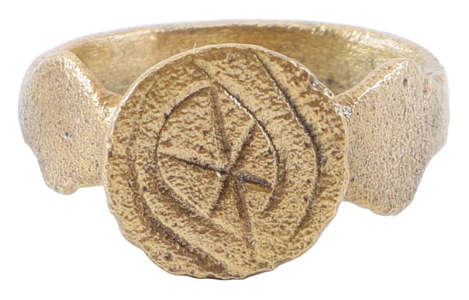 MEDIEVAL WOMAN'S FASHION RING, SIZE 8 1/4: 12th-15th century AD. Women's size 8 1/4. 4.5mm width band with low rounded face, with diamond expansions at the shoulders. Raised circular bezel engraved a line through a saltire. See Ancient Rings, 