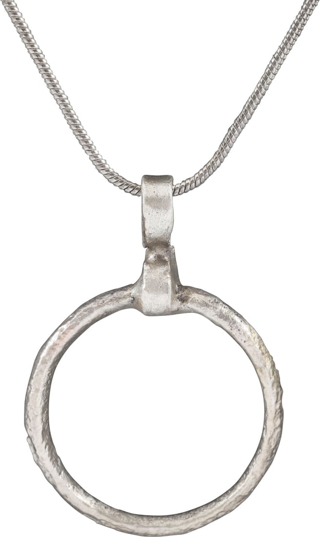 CELTIC PROSPERITY RING NECKLACE C.400-100BC: Before the Roman invasion of the British Isles, rings of bronze, silver, and gold were used as a means of exchange, particularly in Ireland. Most exchanges of goods and property were conducted by bart