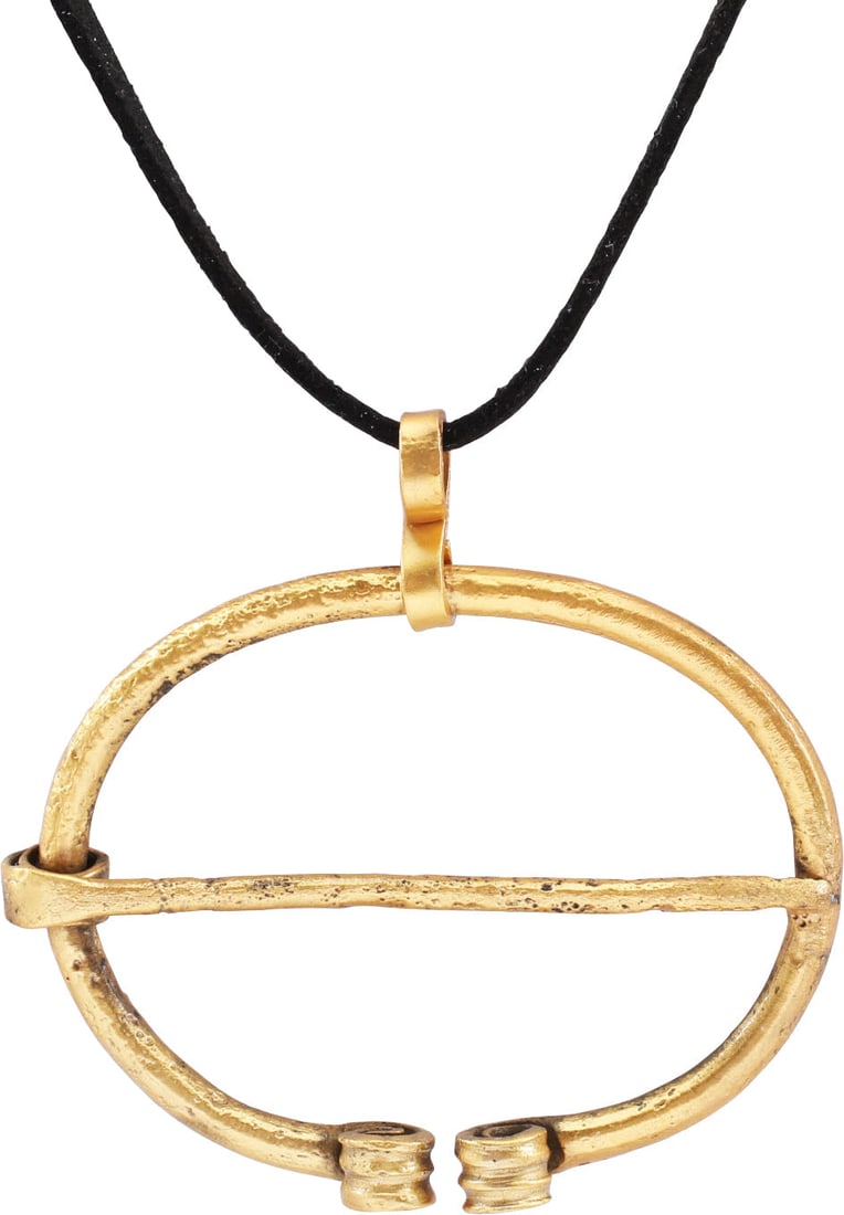 VIKING PROTECTIVE BROOCH NECKLACE, 850-1050 AD: Just under 2 1/2" width (2.42"), oval form, and round section with the ends reeded and curled. Tapered cross pin wound around the frame. Worn in numbers on the leather war jerkin, at an ounce each, a 