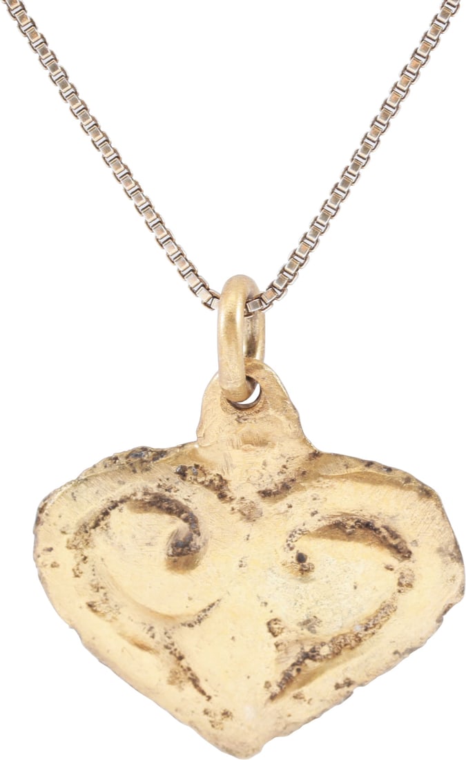 ANCIENT VIKING HEART PENDANT NECKLACE, C.850-1050 AD: Over 1/2" (0.58") in height plus the loop. The heart is fully evolved with cusped top and broad borders forming the cusp and top of the central trefoil, a popular Viking image with supernatural signif