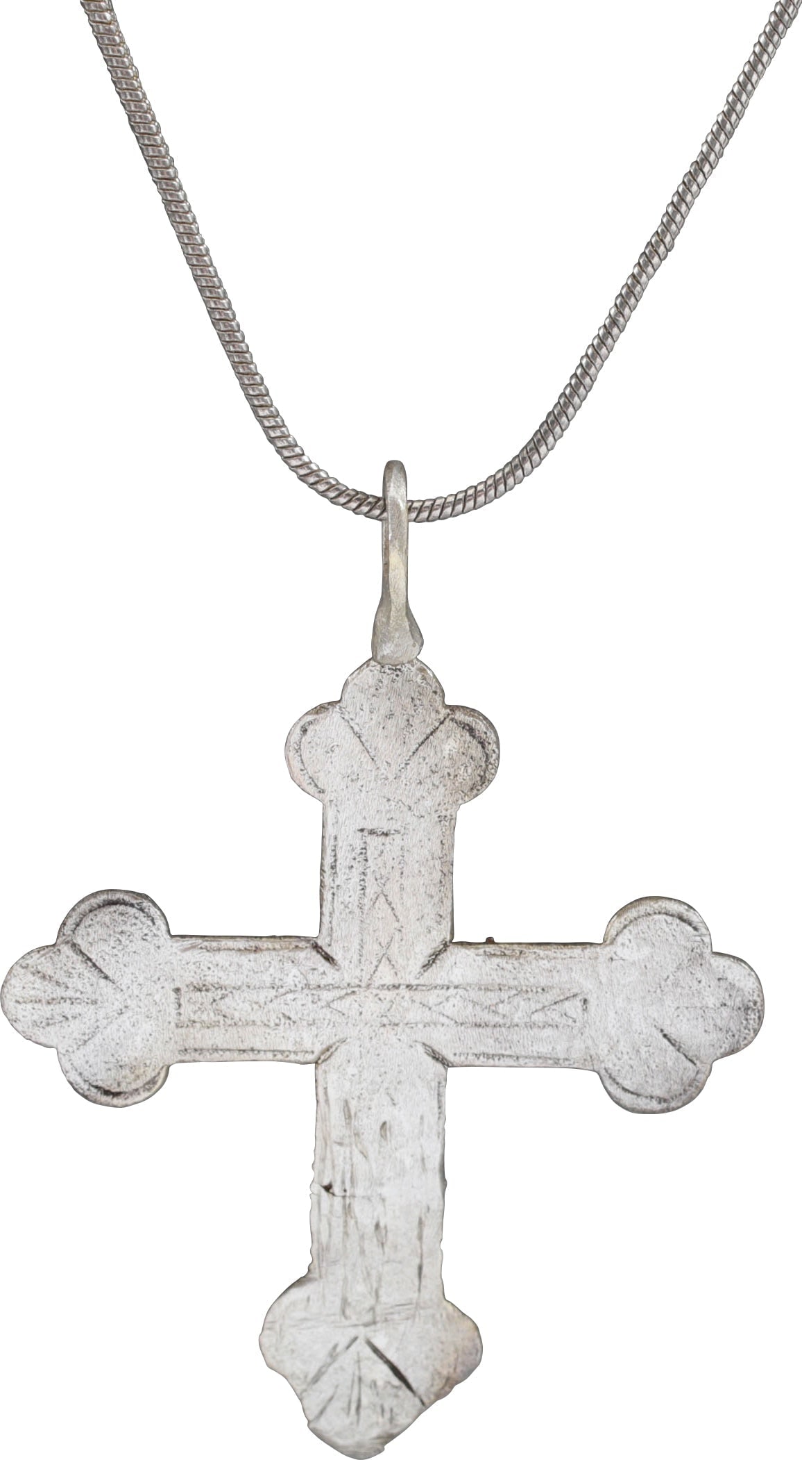 SPANISH COLONIAL CROSS 17TH-18TH CENTURY: Silvered bronze, 1 7/8" height. The cross beam above center and the beam terminals of trefoil form as with the Jerusalem cross, thus representing 5 crosses in one. Incised stick cross with hatched fie