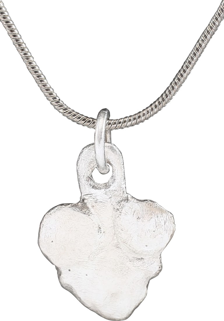 ANCIENT VIKING HEART PENDANT NECKLACE C.850-1050 AD: Classic heart form. Over 1/2" height plus the suspension loop. Formed as addorsed circles above a trefoil, a favorite Viking form. The heart stood for bravery, fortitude, loyalty, integrity, all attri