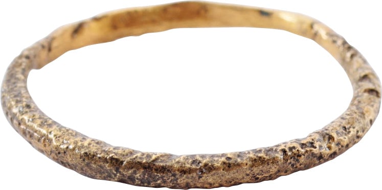 ANCIENT VIKING WEDDING RING, SIZE 8 1/4: Late 9th-early 11th century AD. Gilt bronze, size 8 1/4. Narrow width band 2.0mm, with a rounded face. Professionally refurbished with the 24karat gold overlay restored. Jewelry gift boxed with a Cert