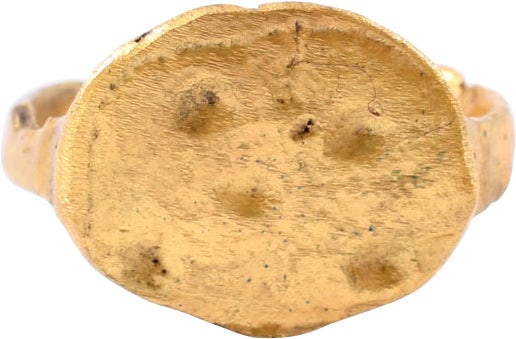 MEDIEVAL ANGLO-SAXON (ENGLISH) RING, SIZE 3 1/2: 5th-8th century AD. 1.9mm rounded face band. Oval bezel with five circle decoration, in an irregular (asymmetrical) pattern, purposefully spaced with spiritual significance now lost. Professionally re