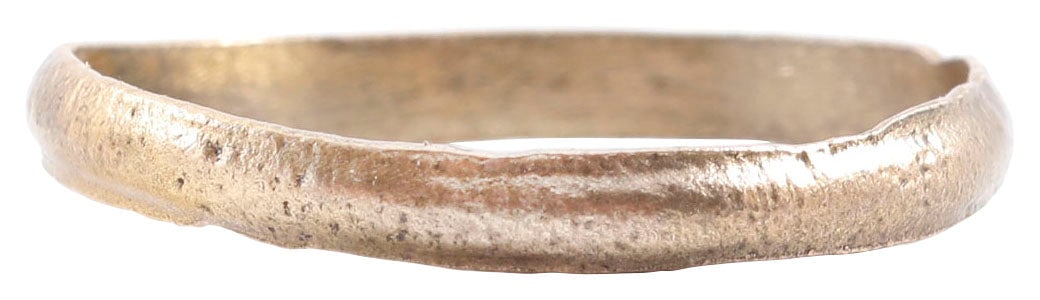 ANCIENT VIKING WEDDING RING, SIZE 10 3/4: Late 9th-early 11th century AD. Gilt bronze, size 10 3/4. Narrow band 3.0mm, with a rounded face. Surface textured from burial. Professionally refurbished with the 24karat gold overlay restored. Jewel